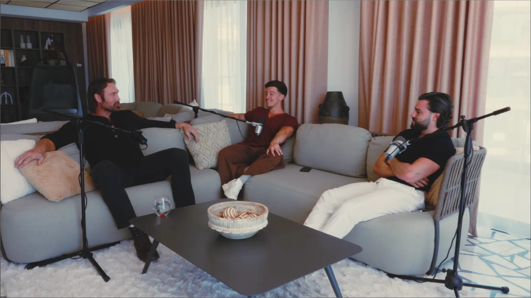 Still from a filmed podcast episode